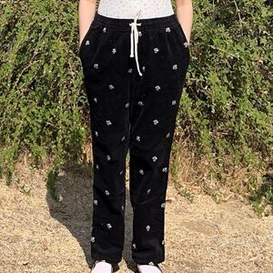 Black corduroy pants with White Floral mushrooms